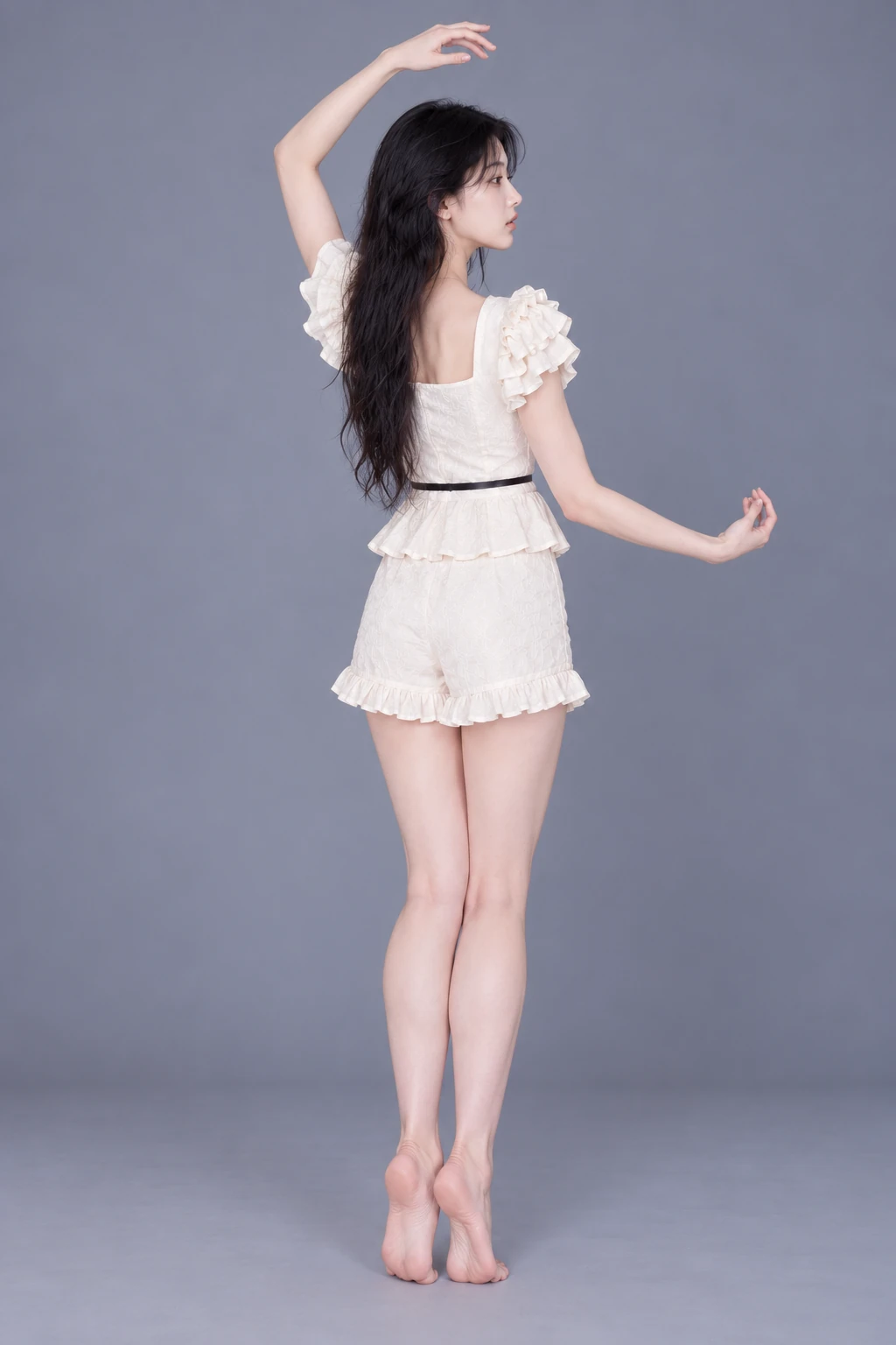 Standing on tiptoe with one arm curved overhead / Reference view